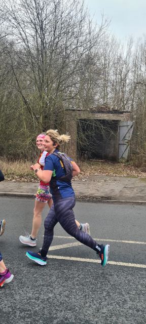Runner on a paved road during a race